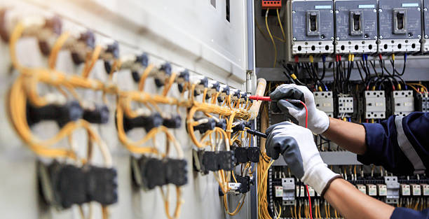 Professional Electrician technician working in Penn Farms, PA